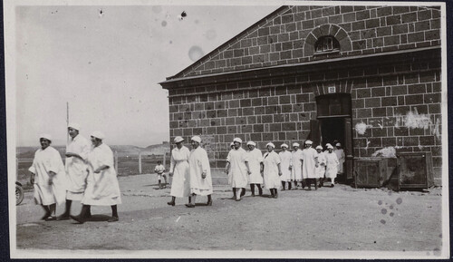 Nursing students leaving clinic building. Alexandropol, c. 1924