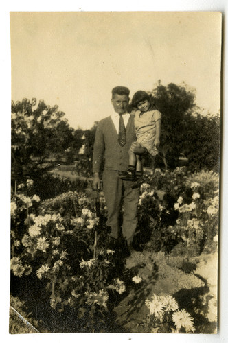 David Hoagland and the orphan Rita in the flower garden, Syra