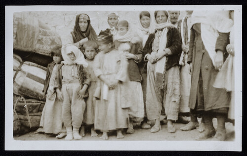Refugee family with its bundles, Caucasus, 1920s