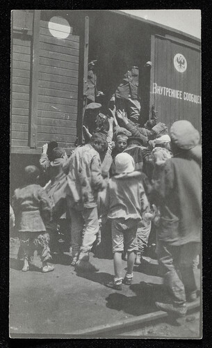 Children boarding a Russian boxcar, early 1920s