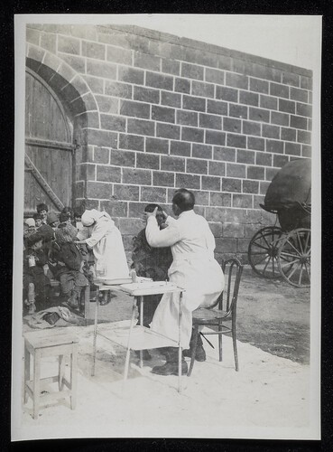 Outdoor clinic at the orphanage wall, Caucasus, 1920s