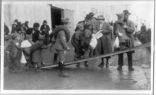 Loading children at the NER facility, Constantinople