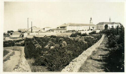 The Syrian Orphanage above its walled garden. Jerusalem, 1919–1920.