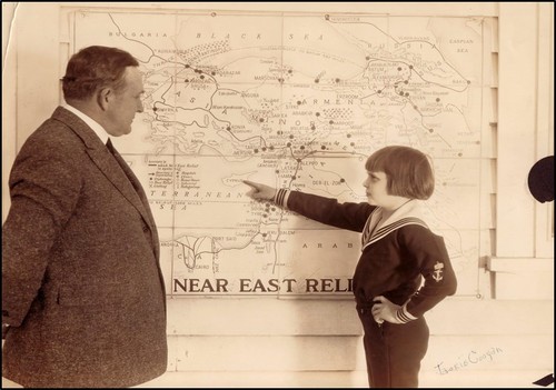 Jackie Coogan with a map of the Near East, 1924