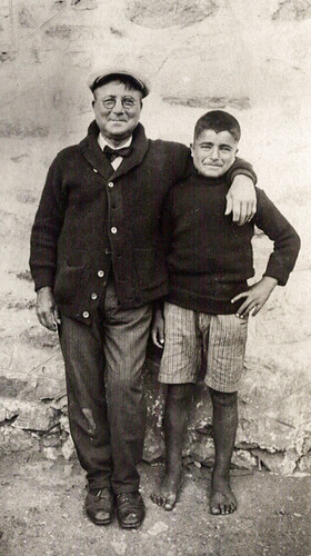 Fred Midgley with the orphan ground-guard, Syra 1926