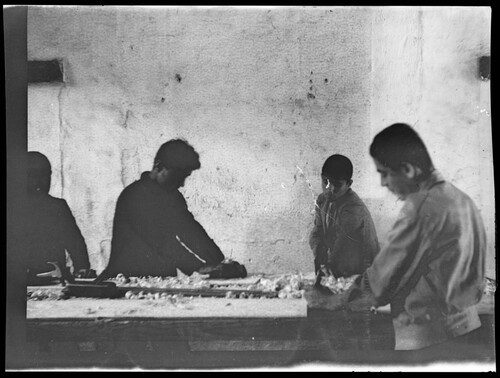 Four boys at a woodworking bench, Near East Relief boys' orphanage, Marsovan (Merzifon).