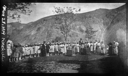 A large assembly of children lines a mountain slope at Karakilisse (Vanadzor), Armenia, May 28, 1919.