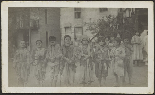Street children gathered and fed by American relief party, Marash