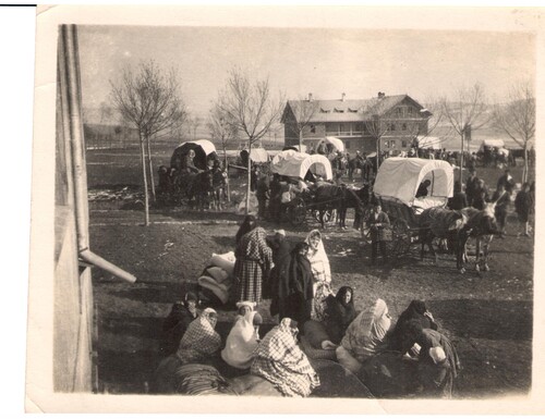 Children are loaded into the wagons at the orphanage. Sivas, 1922.